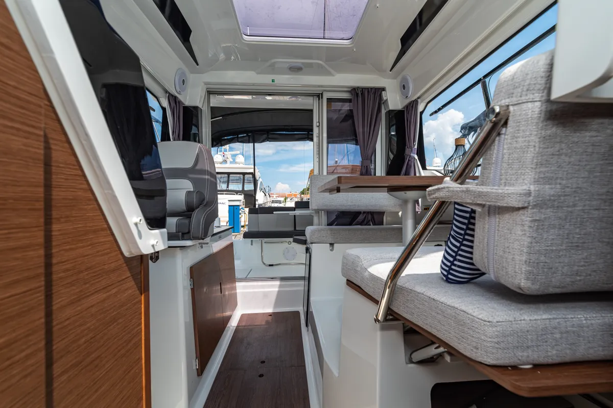 Salon of Klapa, a Jeanneau Merry Fisher 795 motorboat at Municipality of Novigrad, Croatia