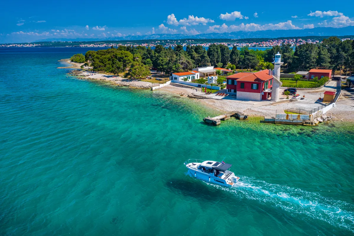 Exterior view of Klapa, a Jeanneau Merry Fisher 795 motorboat at Municipality of Novigrad, Croatia