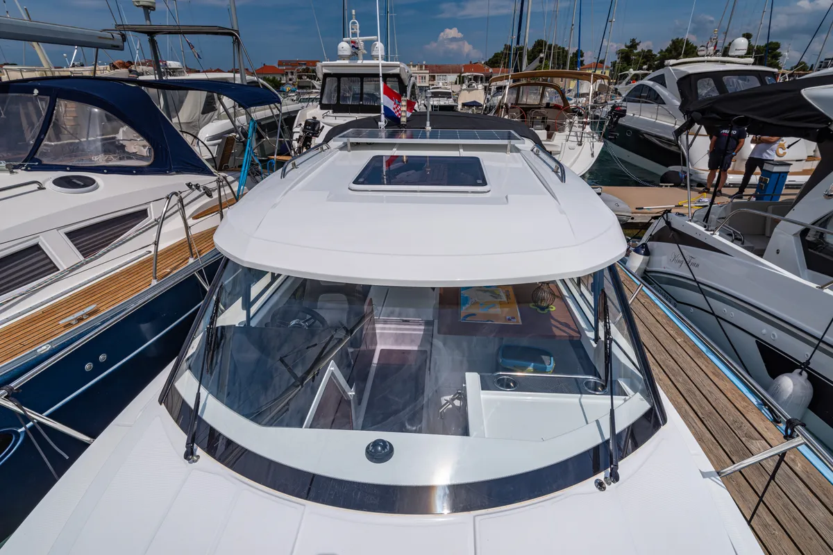 Exterior view of Klapa, a Jeanneau Merry Fisher 795 motorboat at Municipality of Novigrad, Croatia