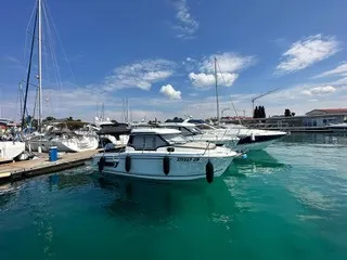 Exterior view of Klapa, a Jeanneau Merry Fisher 795 motorboat at Municipality of Novigrad, Croatia