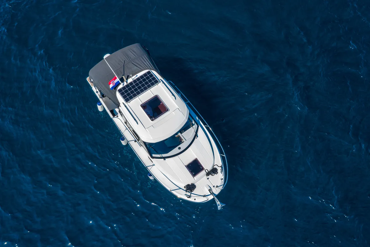 Exterior view of Klapa, a Jeanneau Merry Fisher 795 motorboat at Municipality of Novigrad, Croatia
