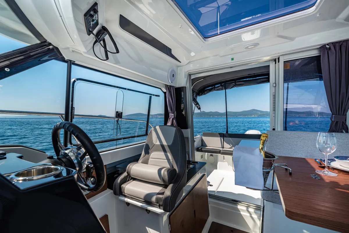 Salon of Klapa, a Jeanneau Merry Fisher 795 motorboat at Municipality of Novigrad, Croatia