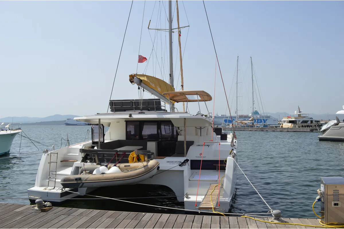 DreamCatcher, a Fountaine Pajot Saona 47 catamaran at Olbia, Italy