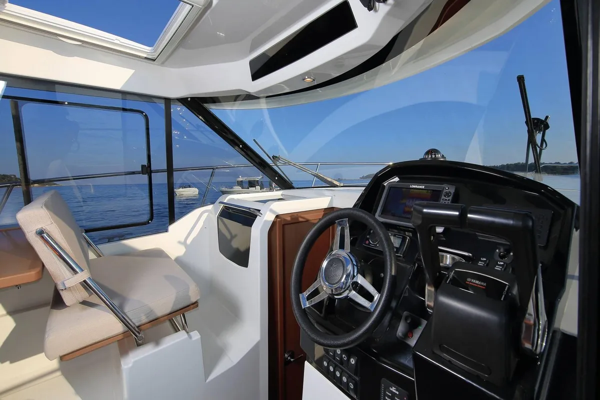 Cockpit of Salty Kiss, a Jeanneau Merry Fisher 895 motorboat at Split, Croatia
