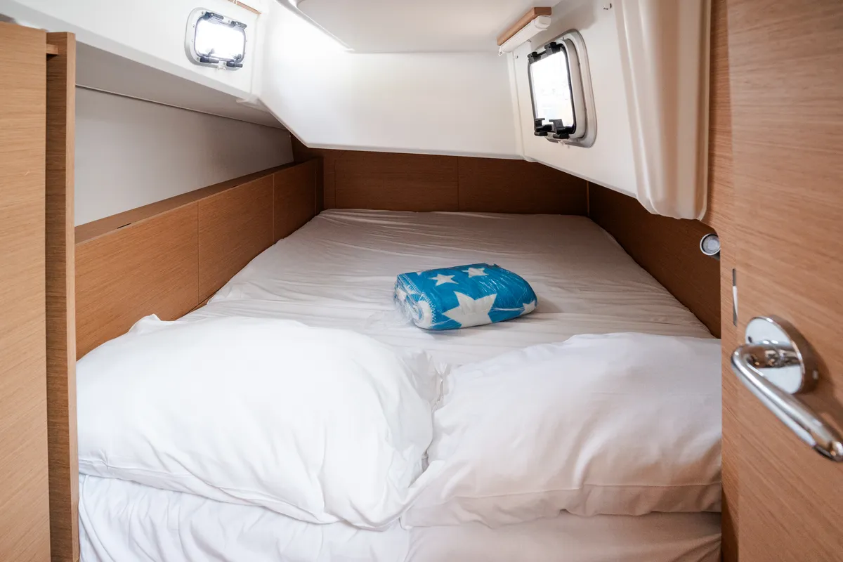 Cabin on Phoenix, a Jeanneau Sun Odyssey 380 sailboat at Rosignano Solvay, Italy