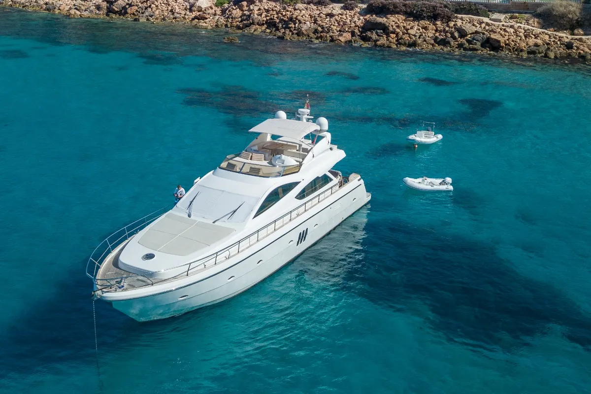 Exterior view of Auri, a Abacus 70 motor yacht at Port d'Andratx, Spain