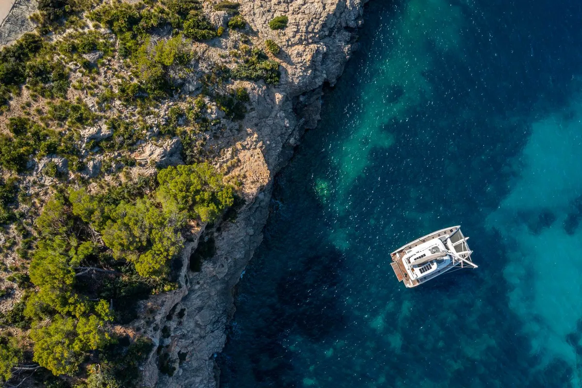 Exterior view of Sofia, a Lagoon 60 catamaran at Olbia, Italy