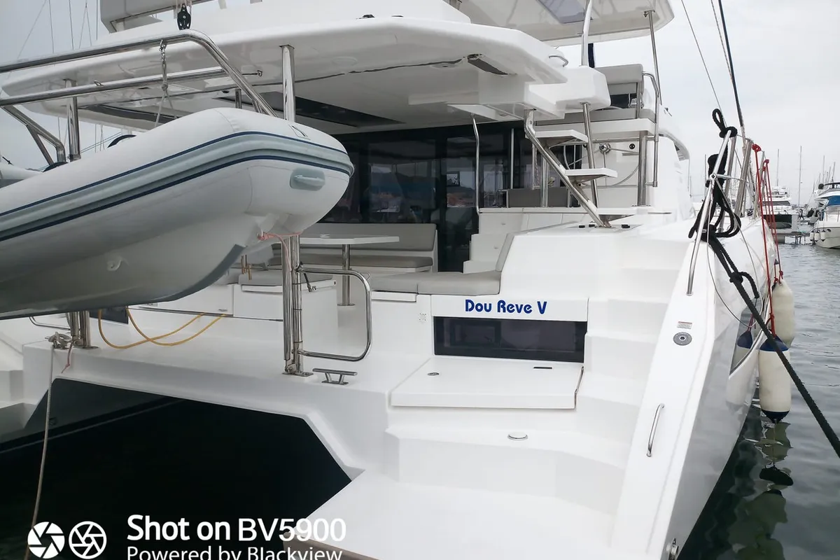 Exterior view of Dou Reve V, a Leopard 45 catamaran at Cannigione, Italy