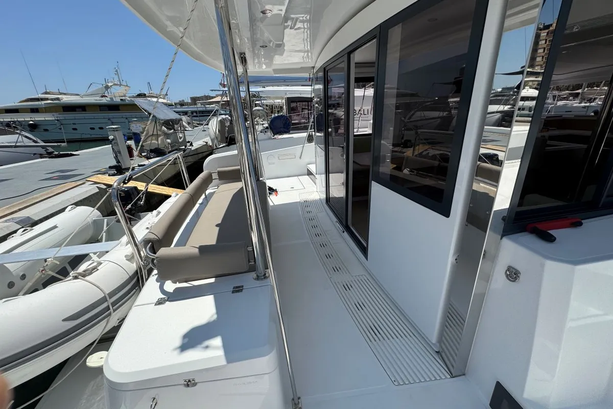 Deck of Voyager 1532/2025, a Bali Catsmart catamaran at Palma de Mallorca, Spain