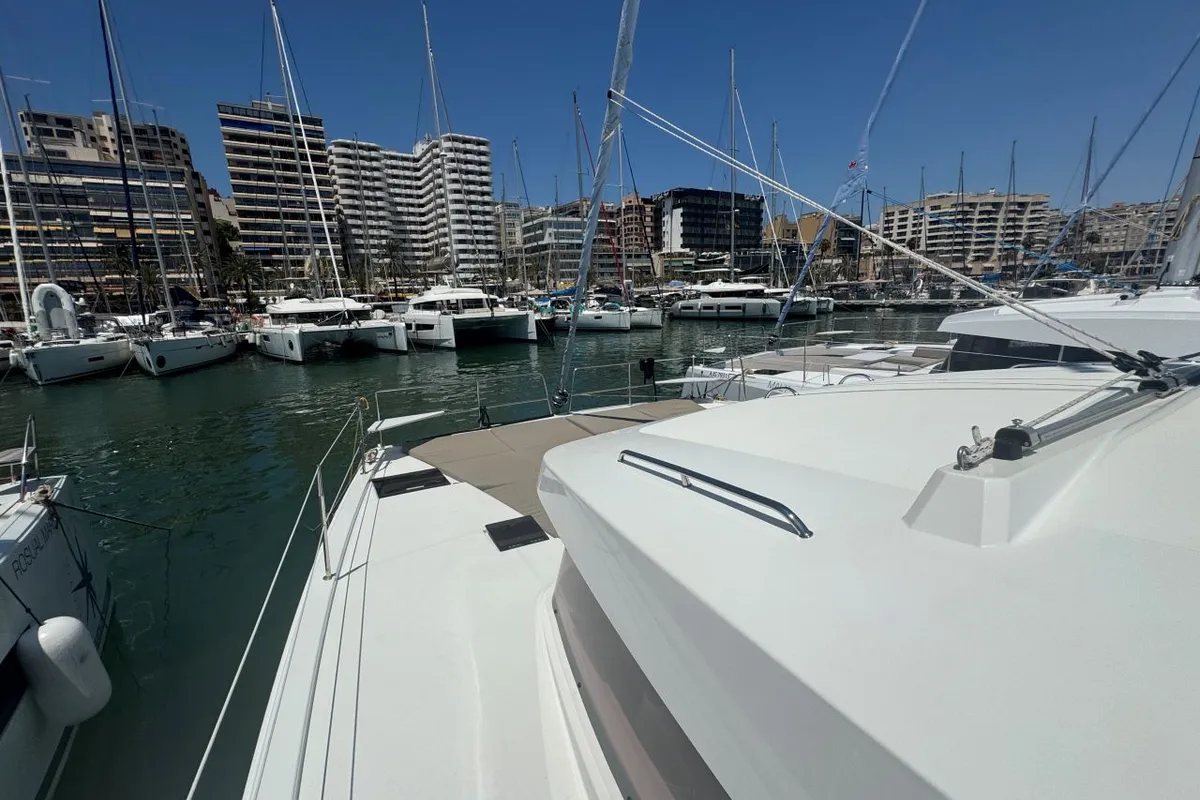 Deck of Voyager 1532/2025, a Bali Catsmart catamaran at Palma de Mallorca, Spain