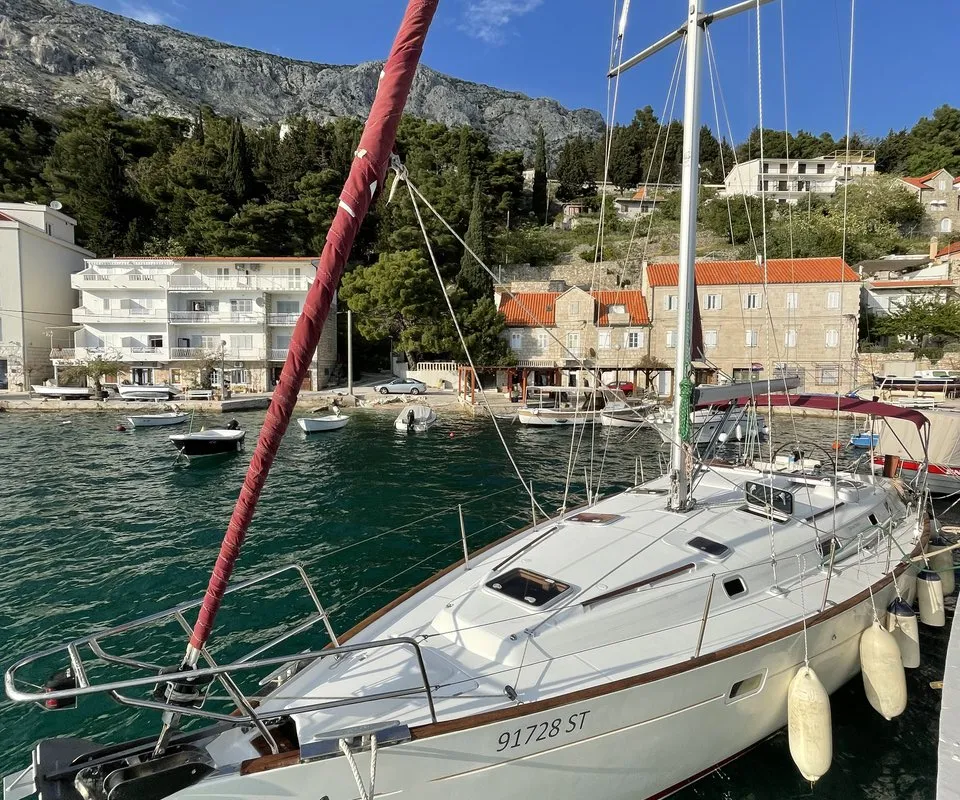 Exterior view of M&M, a Beneteau Oceanis 411 Celebration sailboat at Grad Omiš, Croatia