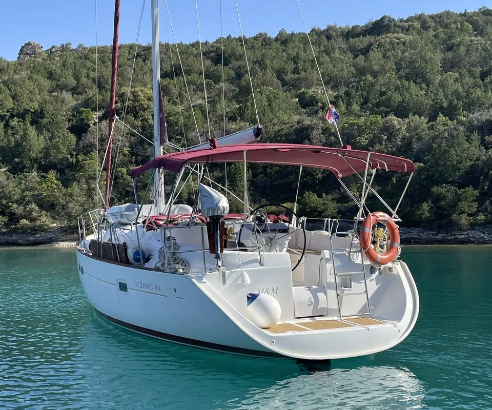 Exterior view of M&M, a Beneteau Oceanis 411 Celebration sailboat at Grad Omiš, Croatia