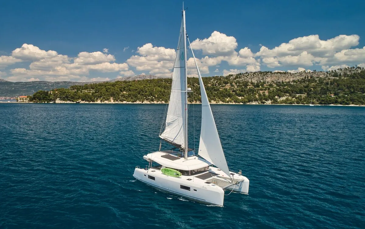 Exterior view of Aura, a Lagoon 42 catamaran at Grad Kaštela, Croatia