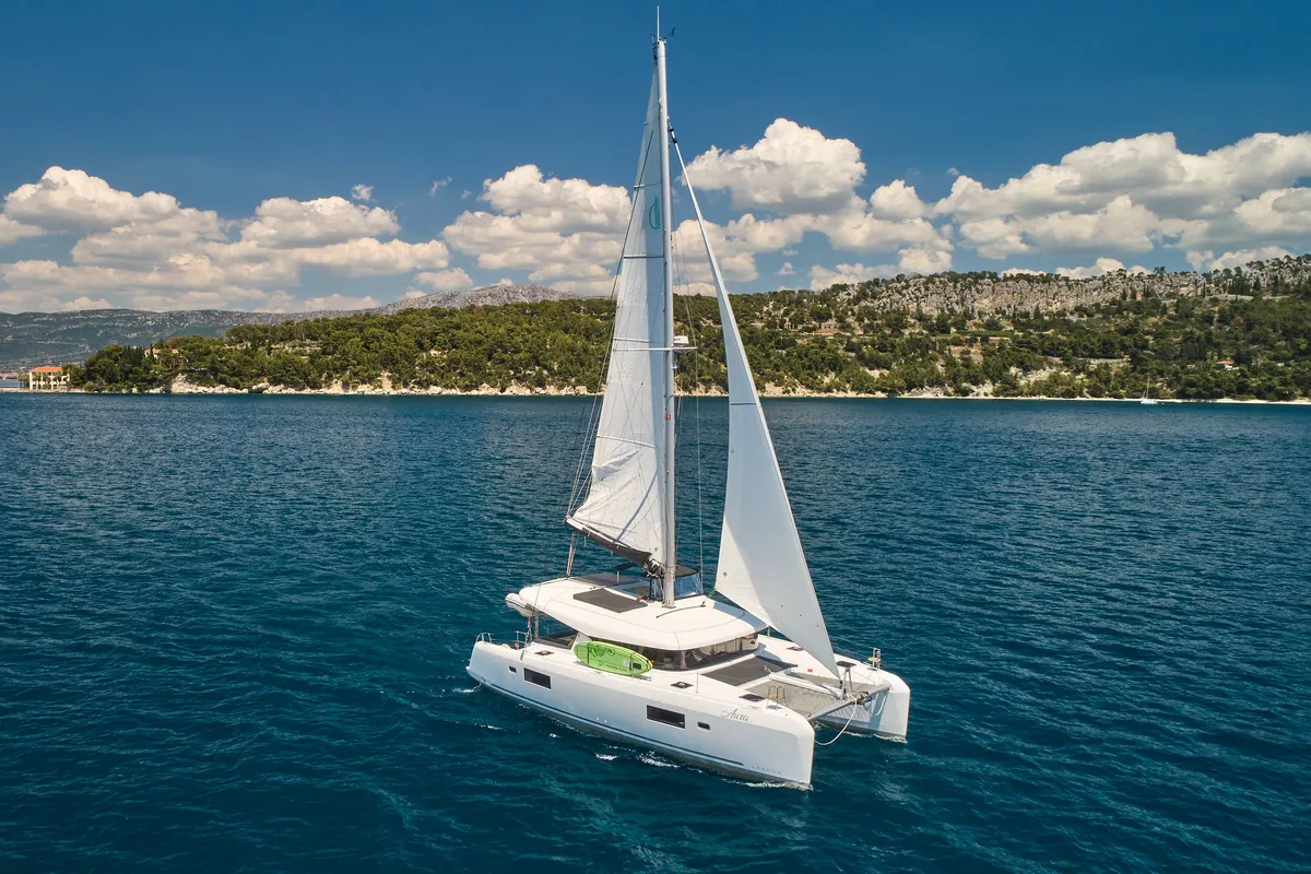 Exterior view of Aura, a Lagoon 42 catamaran at Grad Kaštela, Croatia