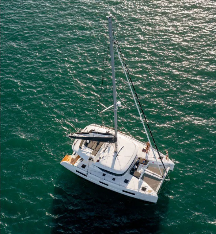 Exterior view of silver elli, a Lagoon 46 catamaran at Sant Antoni de Portmany, Spain
