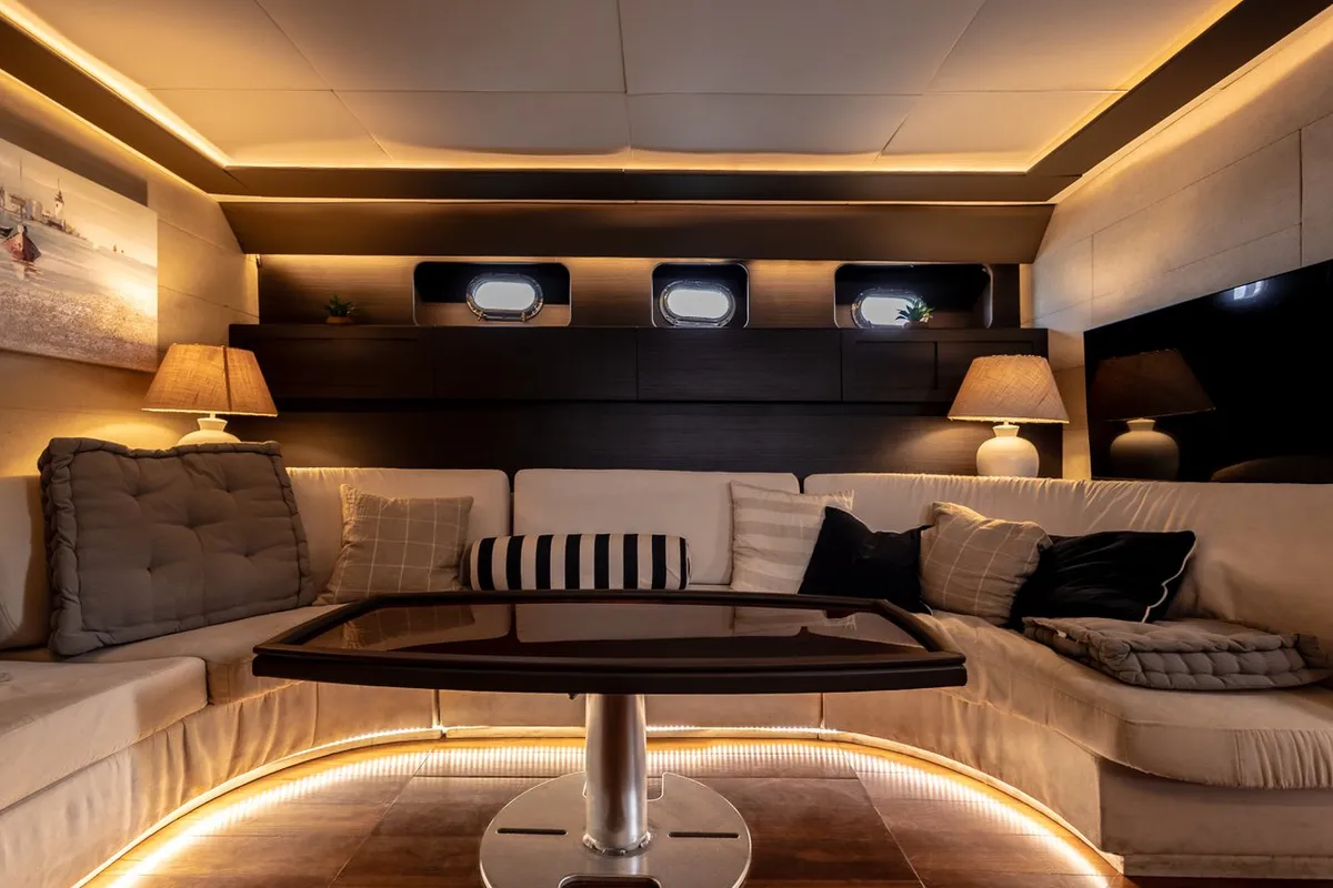 Salon of Maeva Star, a Leopard 23 motor yacht at Milazzo, Italy
