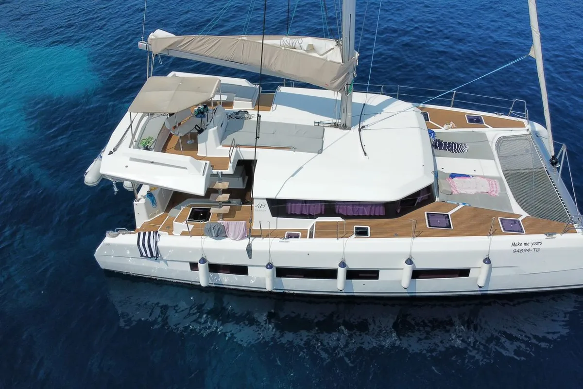 Exterior view of Make Me Yours, a Dufour 48 Catamaran catamaran at Grad Trogir, Croatia