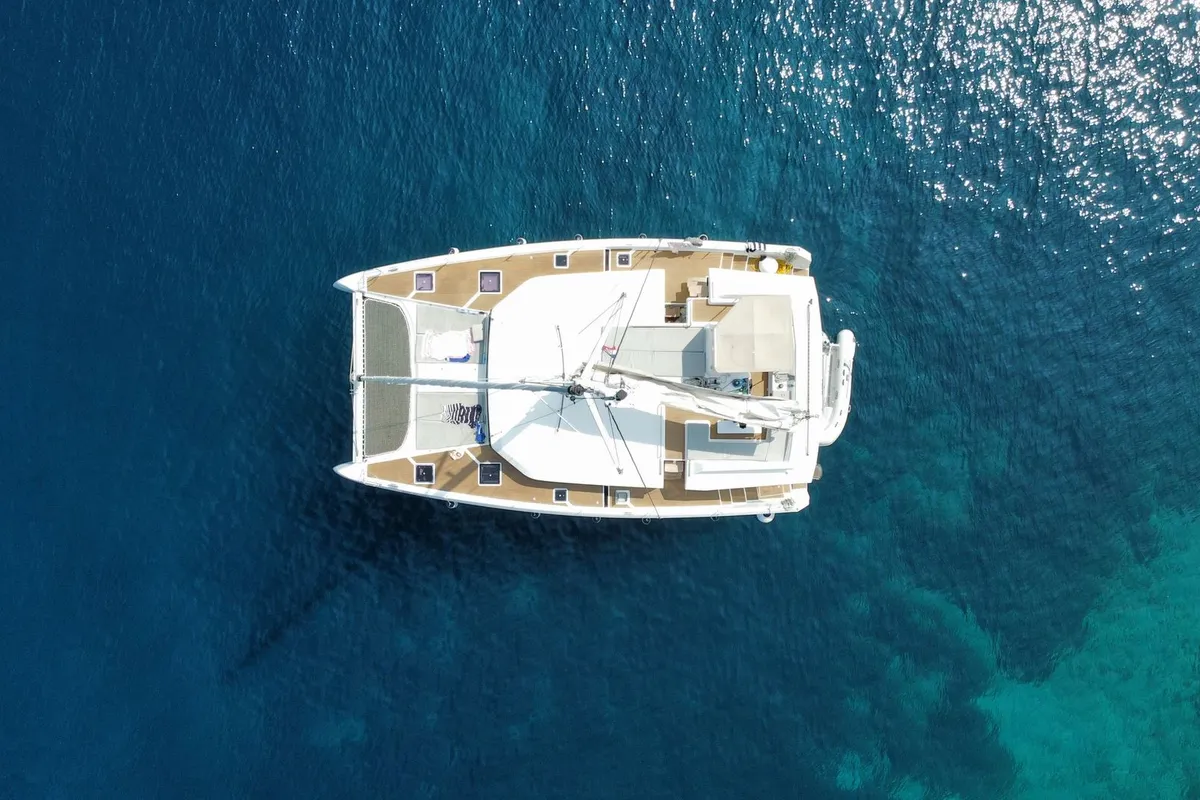 Exterior view of Make Me Yours, a Dufour 48 Catamaran catamaran at Grad Trogir, Croatia
