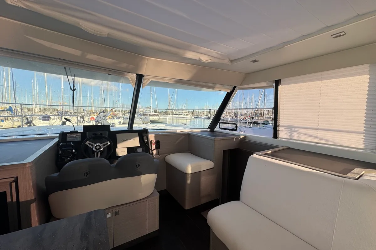 Cockpit of Blue Champagne, a Fountaine Pajot MY4.S - Maestro catamaran at La Rochelle, France