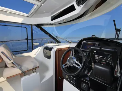 Cockpit of Aquaduck, a Jeanneau Merry Fisher 895 motorboat at Grad Biograd na Moru, Croatia