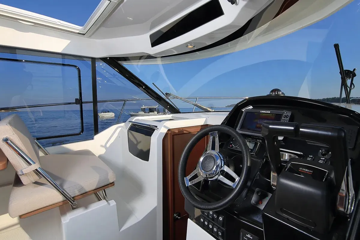 Cockpit of Aquaduck, a Jeanneau Merry Fisher 895 motorboat at Grad Biograd na Moru, Croatia