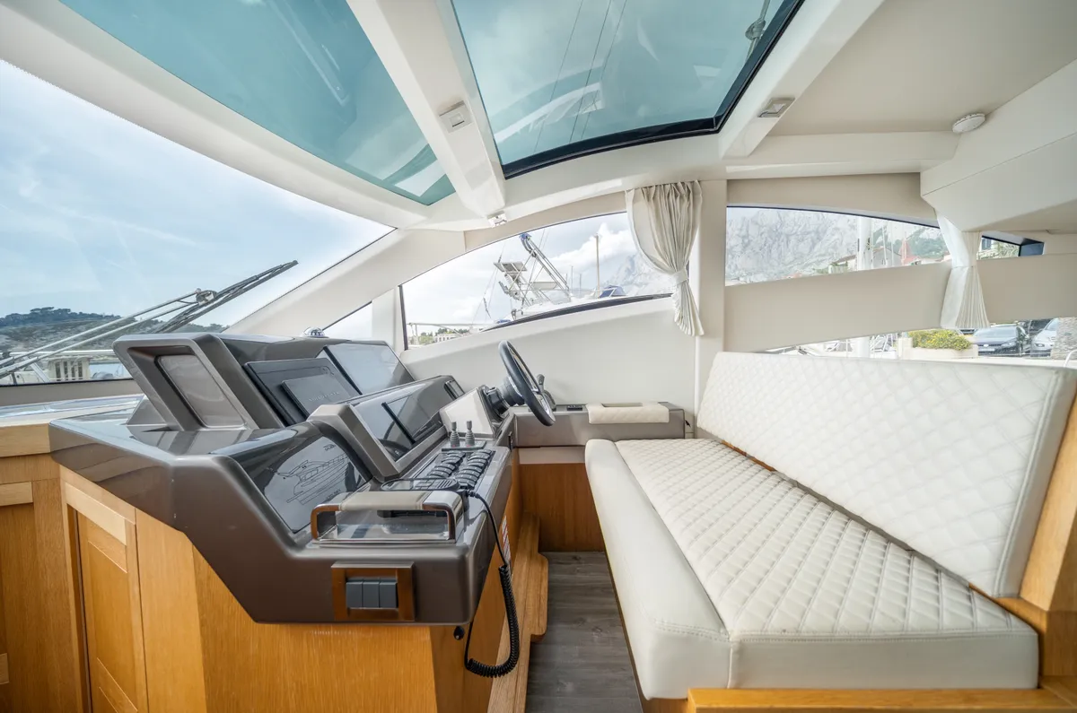 Exterior view of BELLAGIO, a Galeon 430 Skydeck motorboat at Makarska, Croatia