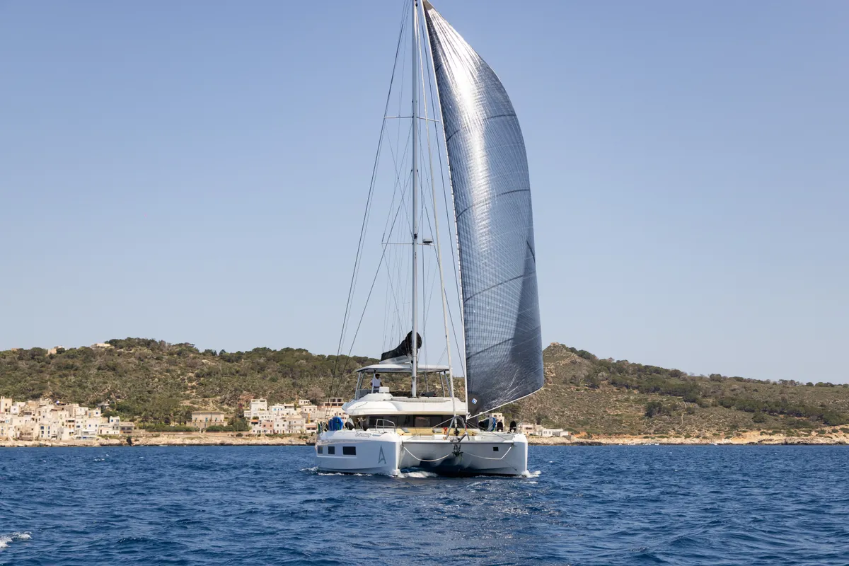 Exterior view of CARA, a Lagoon 55 catamaran at Castellammare di Stabia, Italy
