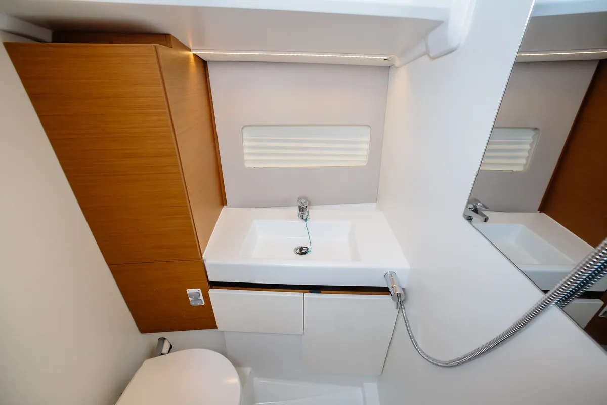 Head on Jeanneau Sun Odyssey 490, a sailboat at Capo d'Orlando, Italy