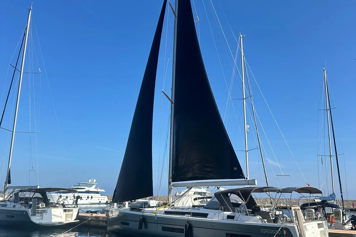 Exterior view of Rhamnus, a Dufour 530 sailboat at Olbia, Italy