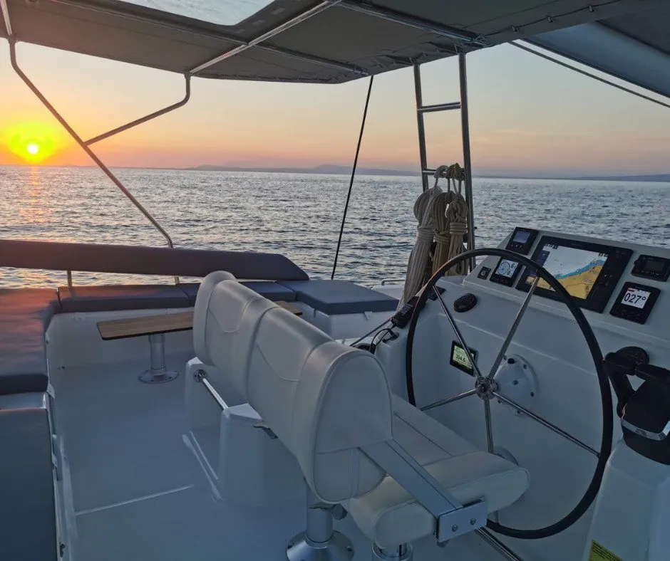 Cockpit of Olga, a Dufour 48 Catamaran catamaran at Salerno, Italy