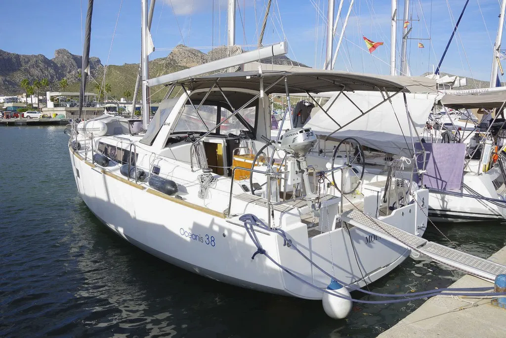 Exterior view of MOIN, a Beneteau Oceanis 38 sailboat at Port de Pollença, Spain