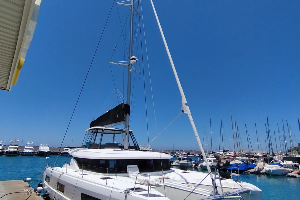 Exterior view of Keep, a Lagoon 46 catamaran at Sant Antoni de Portmany, Spain