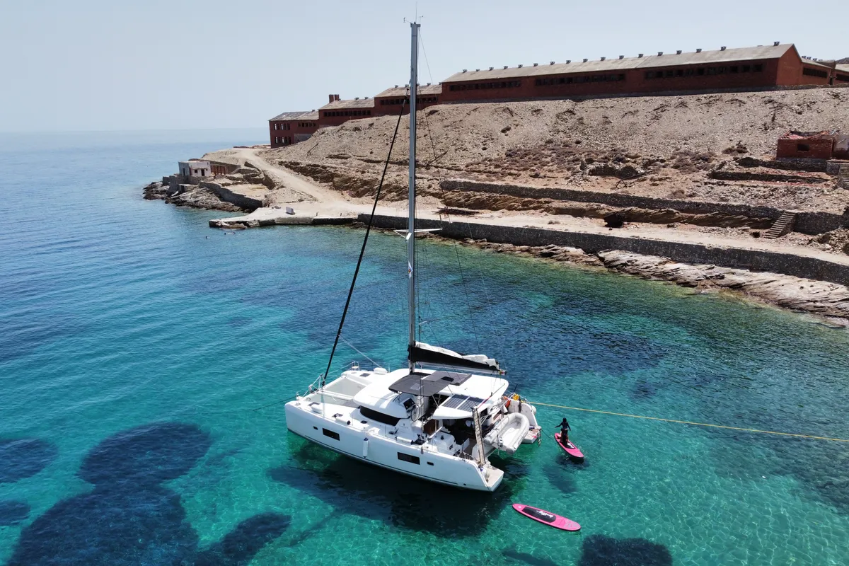 Exterior view of Aktaia, a Lagoon 42 catamaran at Agios Stefanos, Greece