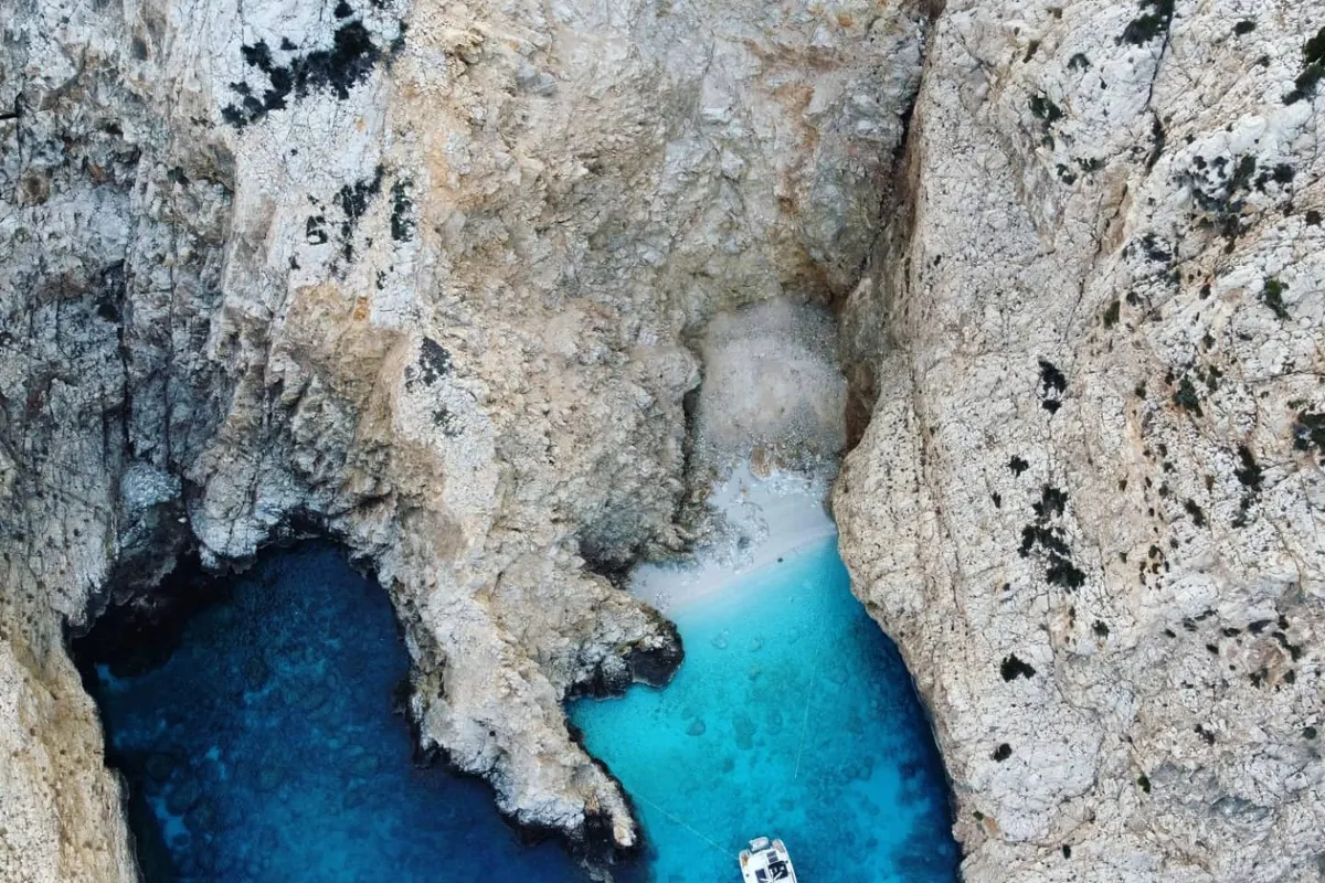 Exterior view of Aktaia, a Lagoon 42 catamaran at Agios Stefanos, Greece