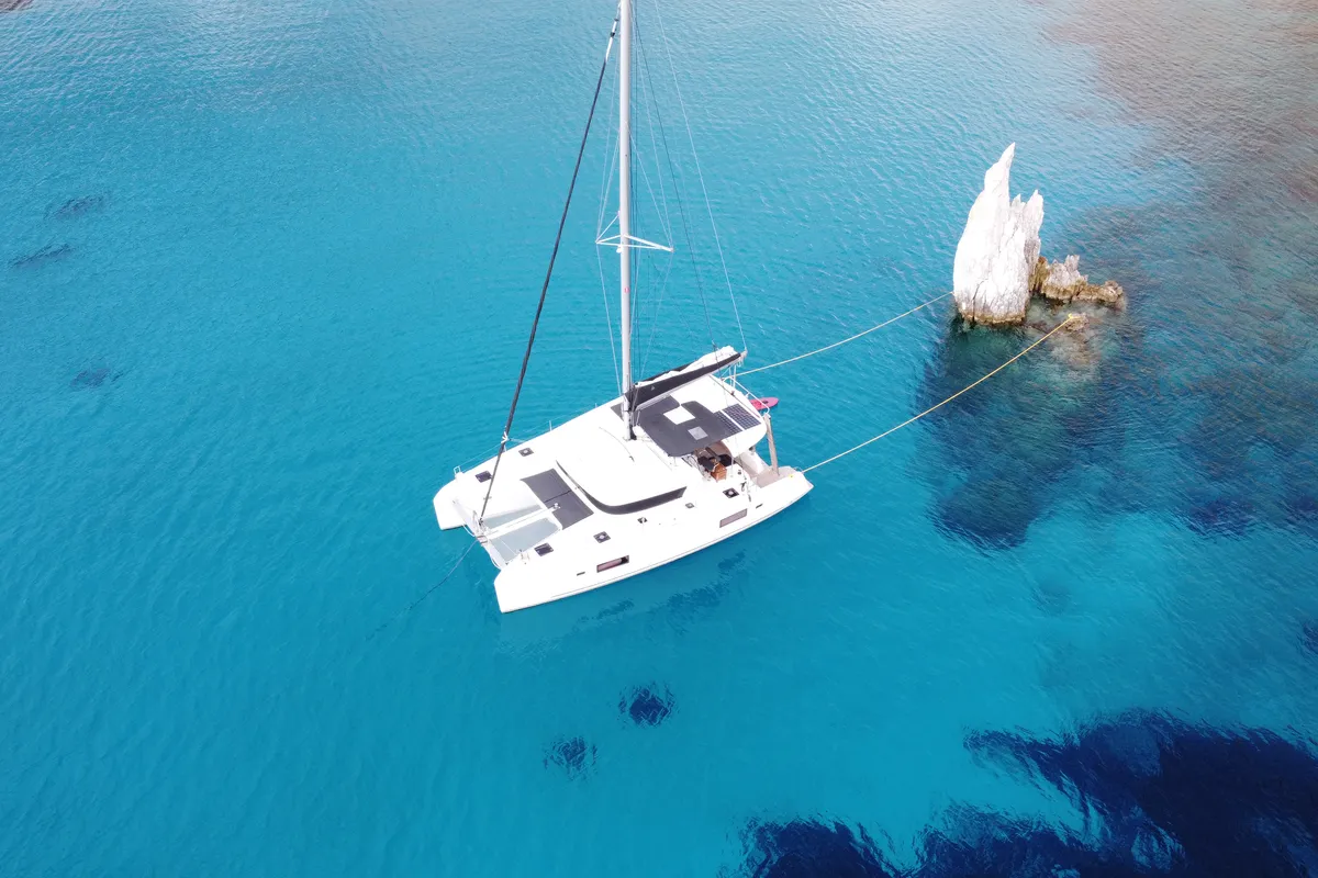 Exterior view of Aktaia, a Lagoon 42 catamaran at Agios Stefanos, Greece
