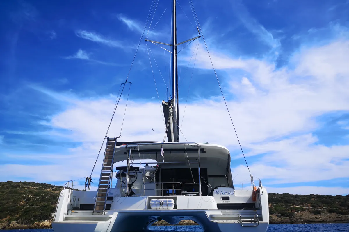 Exterior view of Aktaia, a Lagoon 42 catamaran at Agios Stefanos, Greece