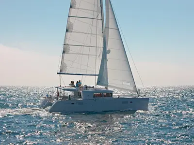 Exterior view of AMARE I, a Lagoon 450 F catamaran at Benitses, Greece