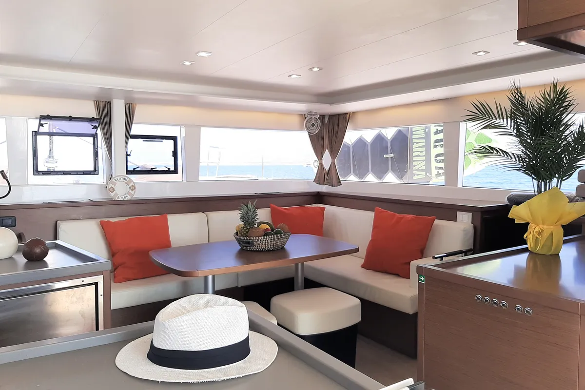 Salon of AMARE I, a Lagoon 450 F catamaran at Benitses, Greece
