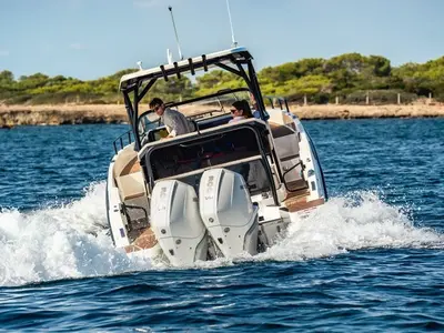 25, a Navan S30 motorboat at Cannigione, Italy