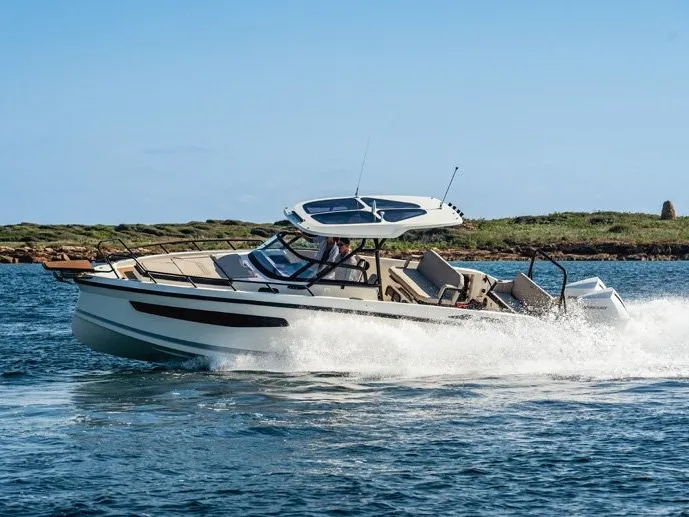 25, a Navan S30 motorboat at Cannigione, Italy