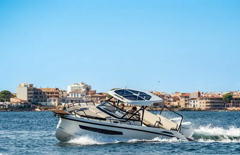 25, a Navan S30 motorboat at Cannigione, Italy