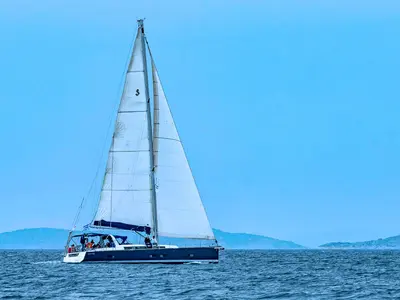 LUCKY TRADER, a Beneteau Oceanis 55 sailboat at Lavreotiki Municipal Unit, Greece