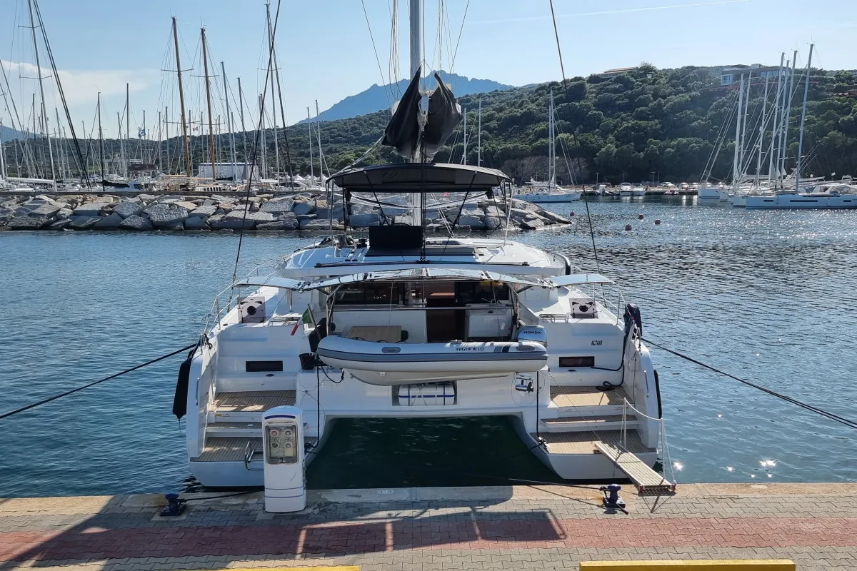 Exterior view of Altair, a Lagoon 46 catamaran at Olbia, Italy