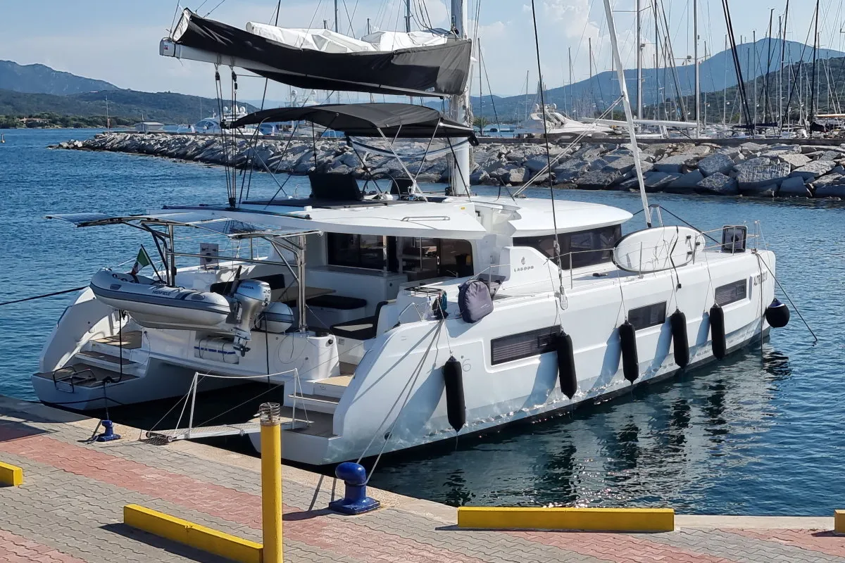 Exterior view of Altair, a Lagoon 46 catamaran at Olbia, Italy