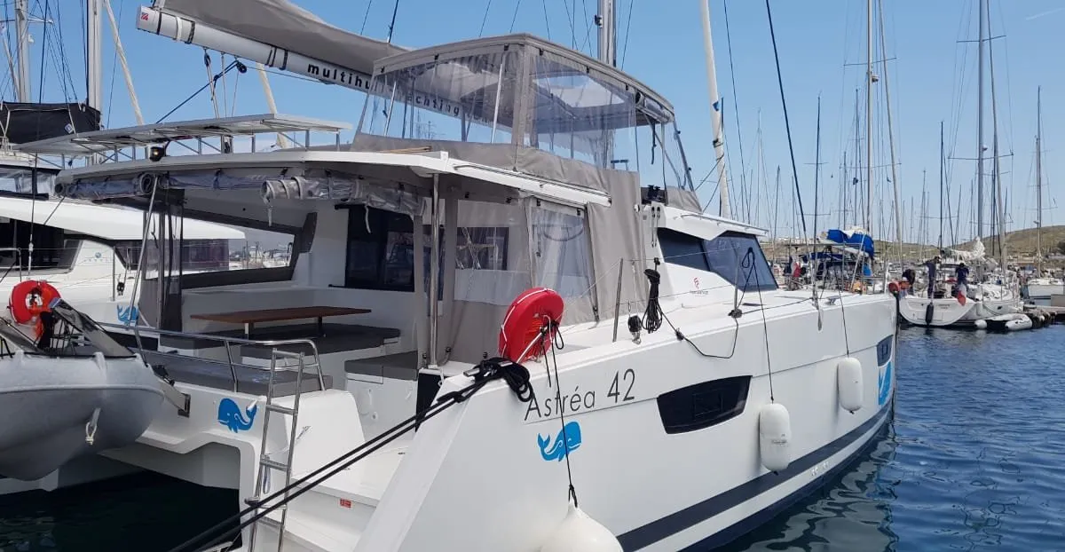 Exterior view of Wild Baleine, a Fountaine Pajot Astrea 42 catamaran at Lavrion, Greece