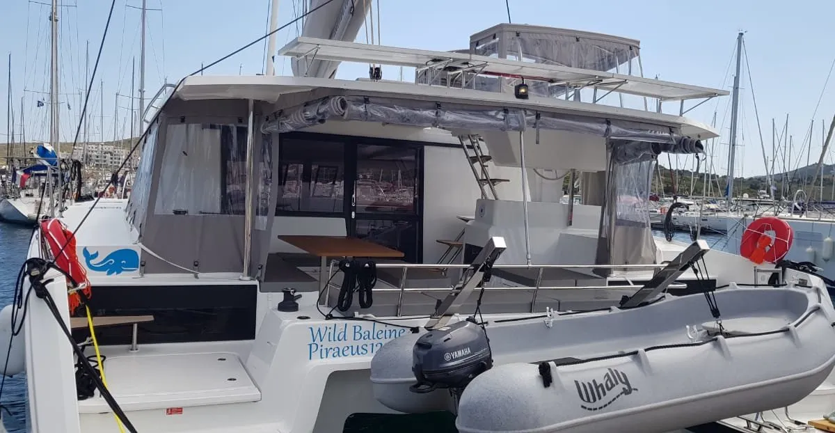 Exterior view of Wild Baleine, a Fountaine Pajot Astrea 42 catamaran at Lavrion, Greece
