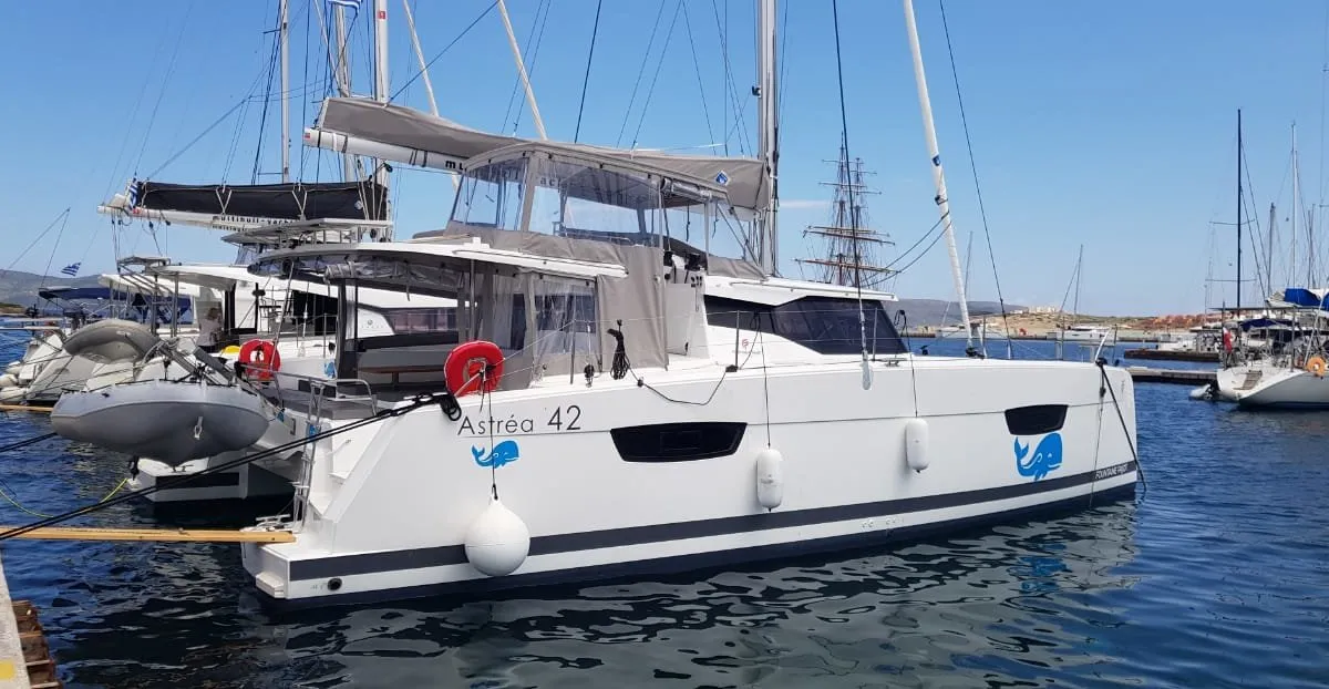 Exterior view of Wild Baleine, a Fountaine Pajot Astrea 42 catamaran at Lavrion, Greece