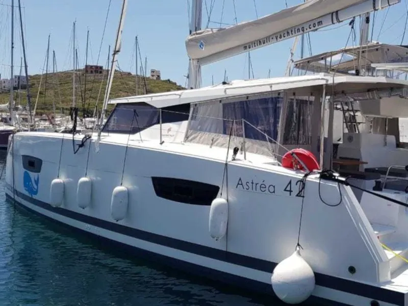 Exterior view of Wild Baleine, a Fountaine Pajot Astrea 42 catamaran at Lavrion, Greece