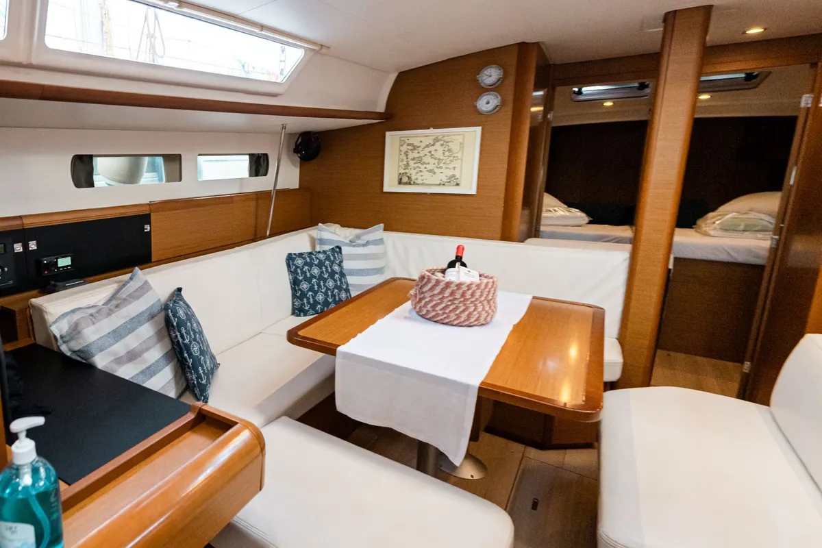 Salon of FILIPPOS I Boat location in LEFKAS MARINA, D-marin 1 SUP FREE, a Jeanneau Sun Odyssey 479 sailboat at Municipal U…