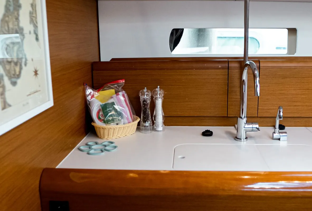 Galley of FILIPPOS I Boat location in LEFKAS MARINA, D-marin 1 SUP FREE, a Jeanneau Sun Odyssey 479 sailboat at Municipal…